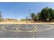 View of community basketball court with hoop and full court lines at 3625 Ennfield Ln, Duluth, GA 30096