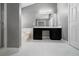 Bathroom showcasing double vanity, large tub, and tiled floors at 3625 Ennfield Ln, Duluth, GA 30096