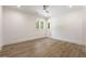 Bedroom with hardwood floors and modern ceiling fan for year-round comfort at 779 Hicks Rd, Canton, GA 30115