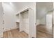 Walk-in closet with custom shelving and hardwood floors, providing ample storage at 779 Hicks Rd, Canton, GA 30115