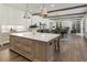 Large kitchen featuring island, counter seating, stainless appliances, and access to dining room at 779 Hicks Rd, Canton, GA 30115
