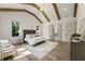 Bright main bedroom with hardwood floors, vaulted ceiling, and plenty of natural light at 779 Hicks Rd, Canton, GA 30115