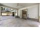 Back patio with stone floors and access to both the bathroom and the main house at 779 Hicks Rd, Canton, GA 30115