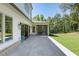 Covered patio with access to a screened-in porch offers indoor-outdoor living at 779 Hicks Rd, Canton, GA 30115