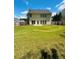 A spacious backyard featuring a well-maintained lawn and wooden fence at 1600 Brisbane Drive, Dacula, GA 30019