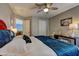 Bedroom with a statement headboard, natural light, and cozy decor at 1600 Brisbane Drive, Dacula, GA 30019