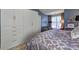 Stylish bedroom with built-in storage, a comfortable bed, and ample natural light at 1600 Brisbane Drive, Dacula, GA 30019