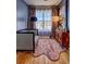 Cozy bedroom with a comfortable daybed, plush rug, and warm lighting at 1600 Brisbane Drive, Dacula, GA 30019