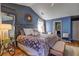 Comfortable main bedroom with soft rug, stylish furnishings, and ample natural light at 1600 Brisbane Drive, Dacula, GA 30019