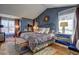 Comfortable main bedroom with ample natural light, soft rug, and stylish furnishings at 1600 Brisbane Drive, Dacula, GA 30019