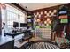 Stylish home office with a large window and unique decorative elements at 1600 Brisbane Drive, Dacula, GA 30019