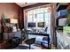 Well-appointed home office featuring a large window, desk, and shelves at 1600 Brisbane Drive, Dacula, GA 30019