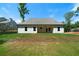 New home backyard with green grass and a covered patio, perfect for outdoor living at 270 Harmony Woods Dr, Dallas, GA 30157