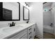 Elegant bathroom with double sink vanity, modern fixtures, and a glass-enclosed shower at 270 Harmony Woods Dr, Dallas, GA 30157