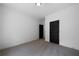 Cozy bedroom featuring new carpeting, fresh paint and a dark wooden door at 270 Harmony Woods Dr, Dallas, GA 30157