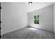 Simple bedroom with carpet and a bright window offering natural light at 270 Harmony Woods Dr, Dallas, GA 30157