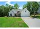 Charming new construction featuring a white board and batten facade and a two-car garage at 270 Harmony Woods Dr, Dallas, GA 30157