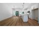 Bright kitchen featuring a kitchen island with pendant lights and stainless steel appliances at 270 Harmony Woods Dr, Dallas, GA 30157