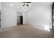 Open main bedroom with carpet, recessed lighting, and open doorway to the main bath at 270 Harmony Woods Dr, Dallas, GA 30157