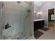 Bathroom features glass enclosed shower and vanity with double sinks at 2882 Clary Hill Ne Dr, Roswell, GA 30075