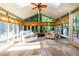 Bright sunroom with skylights, tiled floors, and large windows offering abundant natural light at 2882 Clary Hill Ne Dr, Roswell, GA 30075