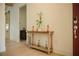 Home's entryway features light hardwood floors, stylish decor, and an eye-catching barn door at 423 Ward Ln, Woodstock, GA 30188