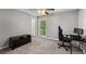 Bedroom with a ceiling fan, a window, and carpeted flooring at 4406 Idlewood Ln, Tucker, GA 30084