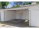 Carport with a concrete floor and white siding at 4406 Idlewood Ln, Tucker, GA 30084