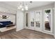 Elegant dining room with natural light, patio access and modern light fixture at 4406 Idlewood Ln, Tucker, GA 30084
