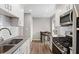 Modern kitchen with sleek countertops, stainless steel appliances, and ample cabinet space at 4406 Idlewood Ln, Tucker, GA 30084