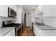 Well-appointed kitchen featuring stainless steel appliances, modern cabinetry, and a functional layout at 4406 Idlewood Ln, Tucker, GA 30084