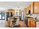 Kitchen with island, stainless appliances, and blue pantry door at 4825 Rollins Dr, Powder Springs, GA 30127