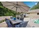 Outdoor patio with seating, pool, and gazebo, perfect for entertaining at 4825 Rollins Dr, Powder Springs, GA 30127