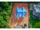 New construction home featuring roof design on a wooded lot in an upscale neighborhood at 2808 Carson Garrett Ct, Buford, GA 30519