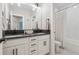 Modern bathroom featuring a double vanity, shower-tub combo, and contemporary finishes at 3445 Henderson Dr, Cumming, GA 30041