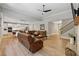 Open-concept living space featuring a seamlessly integrated kitchen and dining area at 3445 Henderson Dr, Cumming, GA 30041