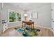 Cozy office space with a desk, large window, and natural light at 3445 Henderson Dr, Cumming, GA 30041