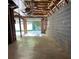 Unfinished basement with block wall, concrete floor and exposed ceiling, ready to be transformed at 72 Victorian Cir, Dallas, GA 30157
