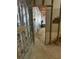 Unfinished basement showcasing framed walls and the opportunity for customization and storage at 72 Victorian Cir, Dallas, GA 30157
