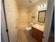 Clean bathroom features a shower and tub combo, complemented by vanity with sink and mirror at 72 Victorian Cir, Dallas, GA 30157