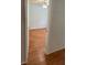 Bright bedroom features hardwood floors and a modern ceiling fan with light at 72 Victorian Cir, Dallas, GA 30157