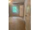 Bright carpeted bedroom offers a large window with natural light and a view at 72 Victorian Cir, Dallas, GA 30157