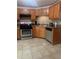 This Kitchen features stainless appliances, and wood cabinets at 72 Victorian Cir, Dallas, GA 30157