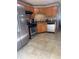 Well-equipped kitchen with stainless steel appliances and light-colored tile flooring at 72 Victorian Cir, Dallas, GA 30157