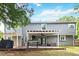 Backyard with deck, grill, and seating at 870 Underhill Ct, Sugar Hill, GA 30518