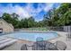 Community pool with chairs and tables at 870 Underhill Ct, Sugar Hill, GA 30518