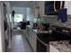 Modern kitchen with stainless steel appliances, granite countertops, and open layout at 2814 Shellbark Rd, Decatur, GA 30035