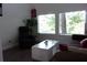 Cozy living room with windows, wood floors, and plenty of seating at 2814 Shellbark Rd, Decatur, GA 30035