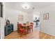 Dining room showcasing hardwood floors, a vintage table, and seating for four at 1424 Tuxworth Cir, Decatur, GA 30033