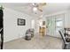 This versatile living room offers great natural light and neutral decor at 1424 Tuxworth Cir, Decatur, GA 30033